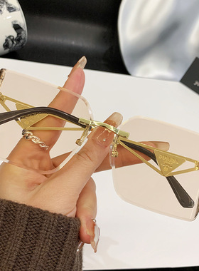 欧洲站新款镂空无框太阳镜大方框高级欧美金属墨镜切边曲面遮阳女