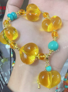 爆款金珀屁桃手链长命富贵手串女款高颜值鸡油黄琥珀浅色屁桃手串