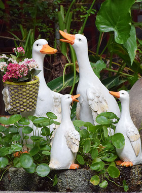 户外花园庭院卡通举牌鸭子玻璃钢雕塑幼儿园装饰创意个性花盆摆件
