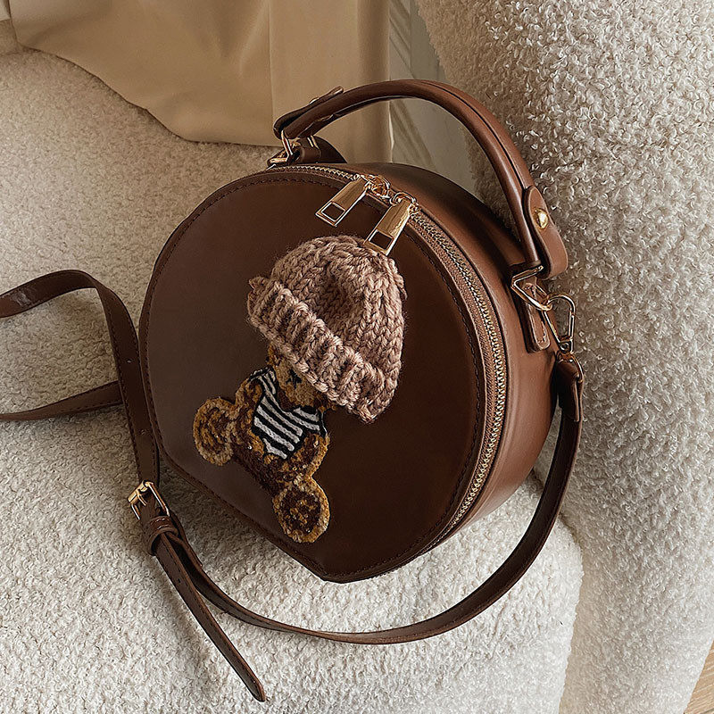 高级感可爱小众手提包包女春夏2025新款时尚少女斜挎包洋气小圆包,淘宝优惠券,粉丝福利购,淘宝优惠卷