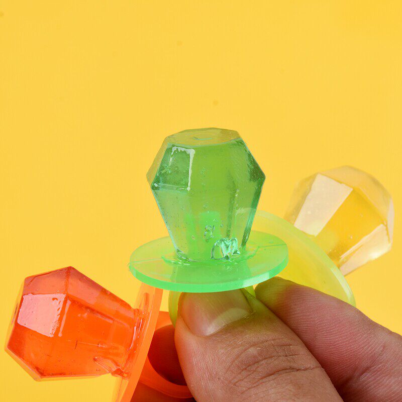 Rings, pacifiers, lipsticks, lollipops, nostalgic snacks, gems, diamonds, children’s day candy