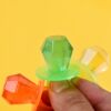 Rings, pacifiers, lipsticks, lollipops, nostalgic snacks, gems, diamonds, children’s day candy