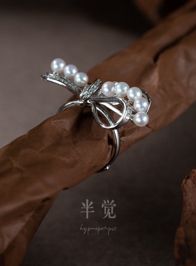 半觉知性优雅满钻蝴蝶结特选正圆极光炫彩珍珠彰显段位S925银排戒