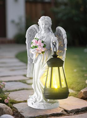 跨境抱花天使女孩户外太阳能花园装饰雕像庭院摆件夜灯树脂工艺品