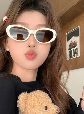 时尚度假风椭圆猫眼拍照出片墨镜海边椰椰甜酷辣妹风太阳镜防晒