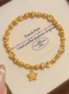 古法金色拉丝猫眼星星串珠手链女