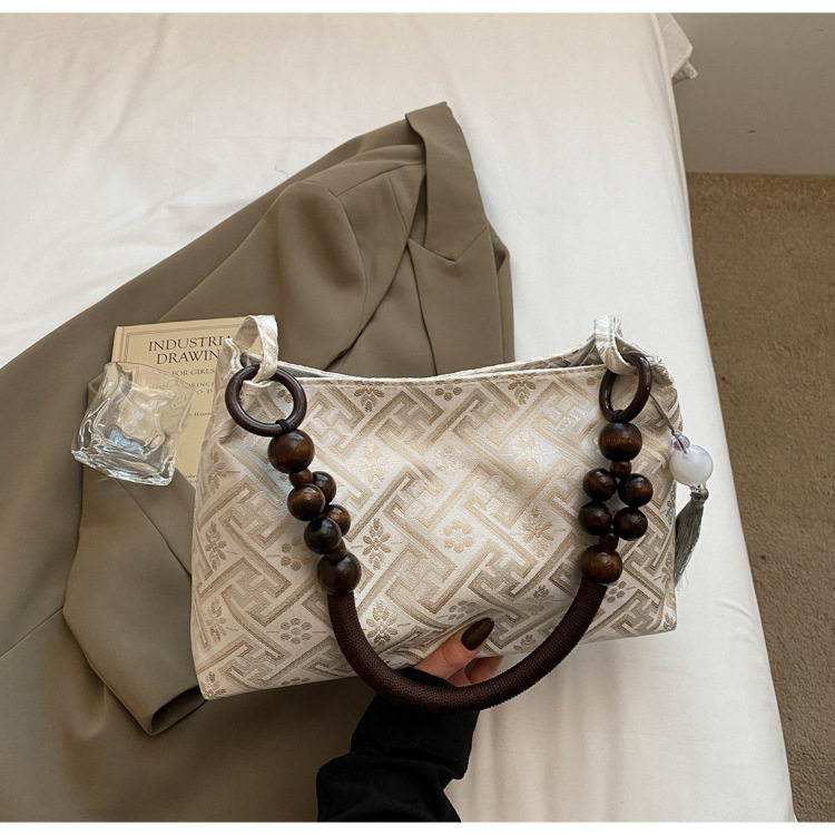 广西壮锦包包新中式腋下包包女2025新款夏天简约布包单肩手提包,淘宝优惠券,粉丝福利购,淘宝优惠卷