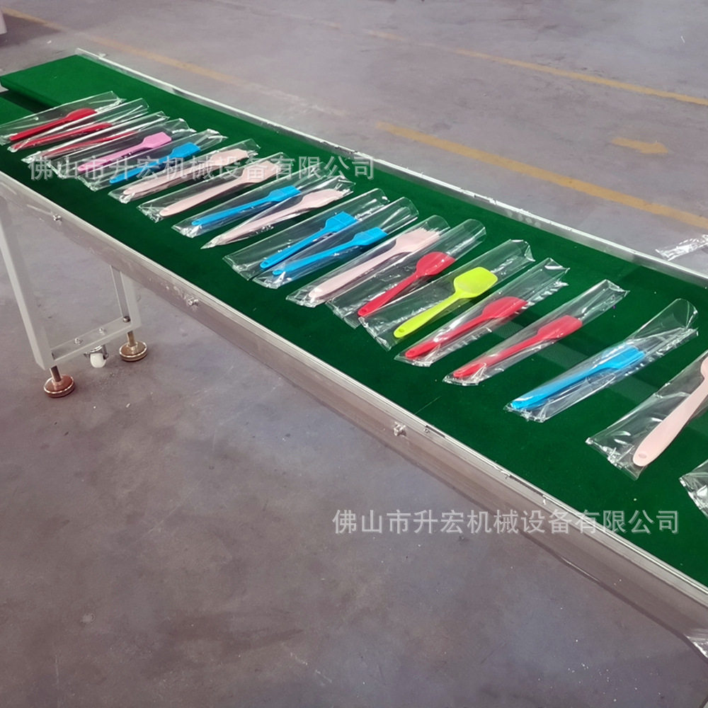 阳江硅胶锅厨具自动包装机 硅胶锅铲不粘锅油刷汤勺枕式包装机,淘宝优惠券,粉丝福利购,淘宝优惠卷