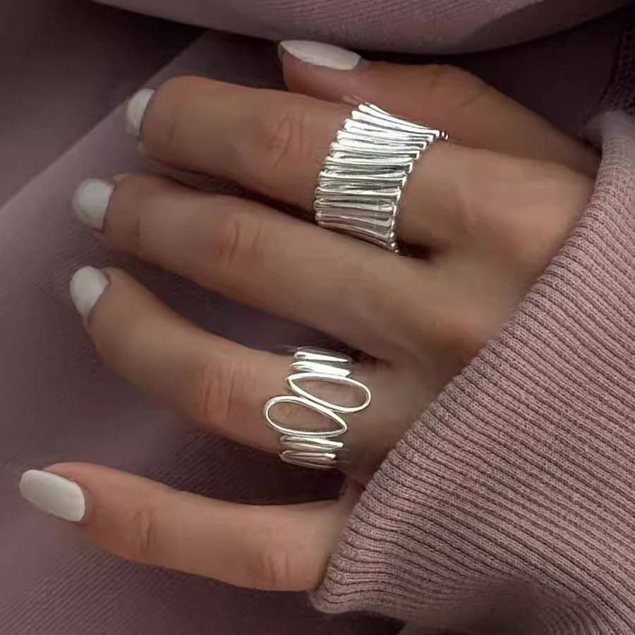 Korean style hollow irregular water drop silver ring women's simple and versatile INS fashion niche design open ring