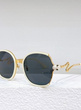 金属板材椭圆大框太阳眼镜女9735时尚镶钻蛇形镜腿遮阳墨镜男黑红