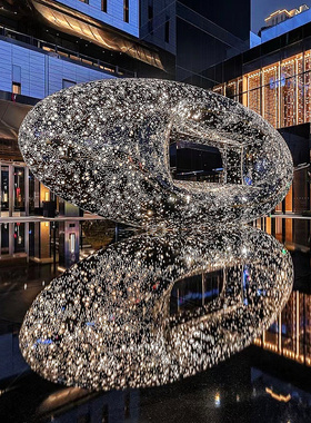 定制大型不锈钢镂空椭圆球景观标志金属发光抽象地产雕塑庭院装饰