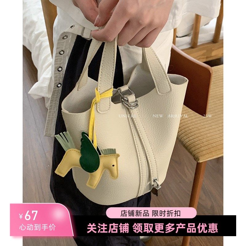 水桶包包女斜挎小包大容量2025夏季新款小清R新通勤超火单肩包,淘宝优惠券,粉丝福利购,淘宝优惠卷