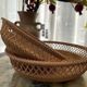 Vietnamese rattan fruit basket, round hollow fruit tray living room desktop storage basket, snack dried fruit classification storage plate