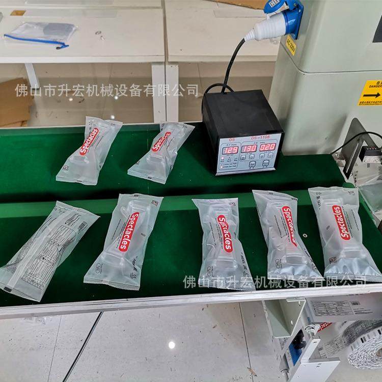 厂家直供防护眼镜包装机护目眼镜套袋包装机防喷护眼镜包装机械,淘宝优惠券,粉丝福利购,淘宝优惠卷