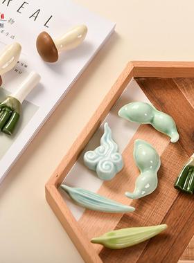 可爱柿子筷子架镇纸笔搁笔架陶瓷小摆件瓷器笔托茶宠创意礼物桌面