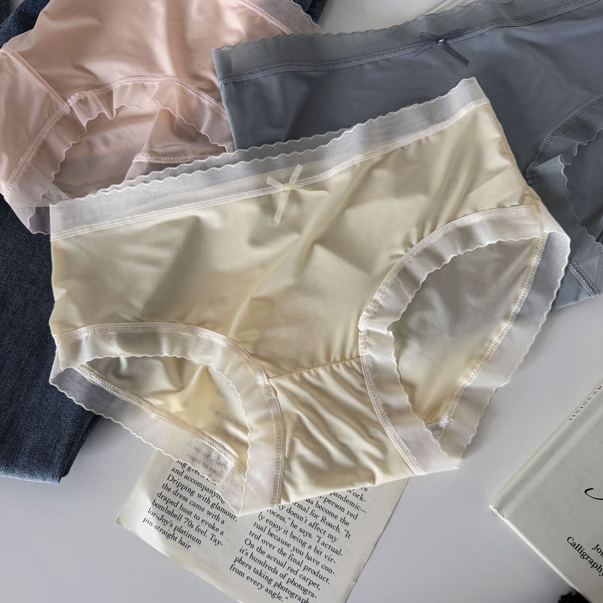 夏季无痕冰丝内裤女纯棉裆透气纯欲性感薄款中腰少女三角内裤批发 - 图2