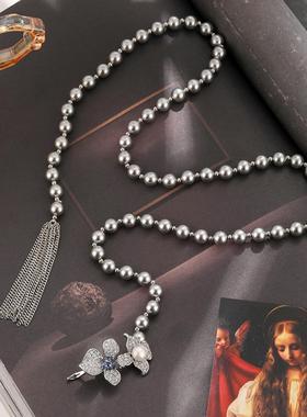 施家珍珠花朵毛衣链女款