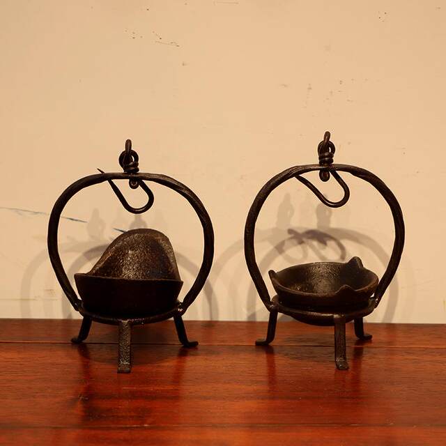 Folk old objects, cast iron small hanging lamps, nostalgic collection of retro film and television props, farmhouse ornaments, antiques and miscellaneous items