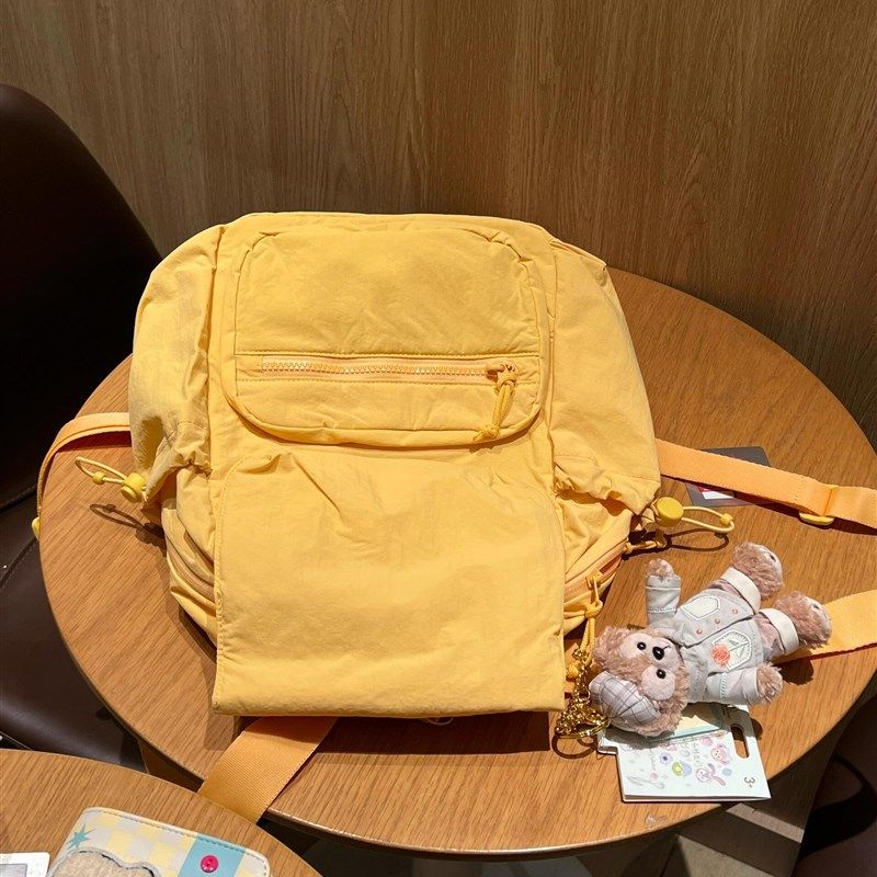 童趣户外运动奶黄双肩包学生通勤简约书包休闲百搭轻便旅行包背包,淘宝优惠券,粉丝福利购,淘宝优惠卷