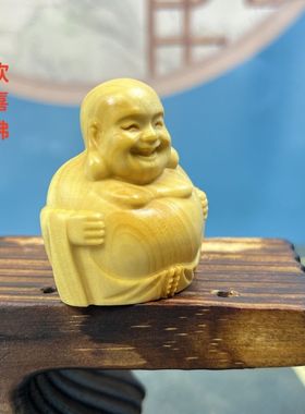 黄杨木雕笑脸弥勒佛手把件