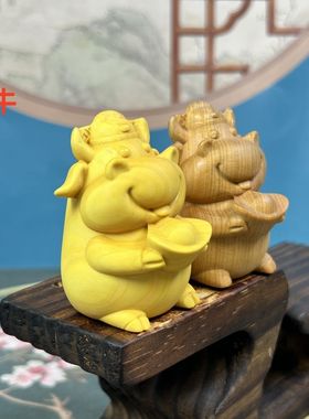 黄杨木雕生肖牛招财手把件