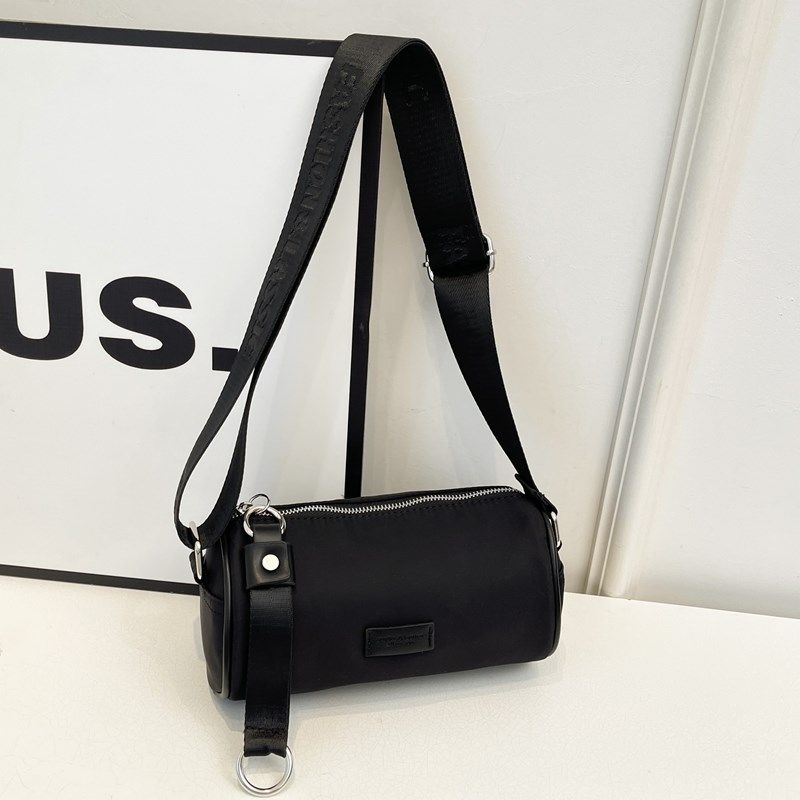 【背部有贴袋】休闲宽肩带小众牛津布圆筒包斜挎包2024新款小包包,淘宝优惠券,粉丝福利购,淘宝优惠卷