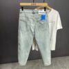 Trendy brand high-end quality light blue men's jeans loose breathable straight American high street casual nine-point pants