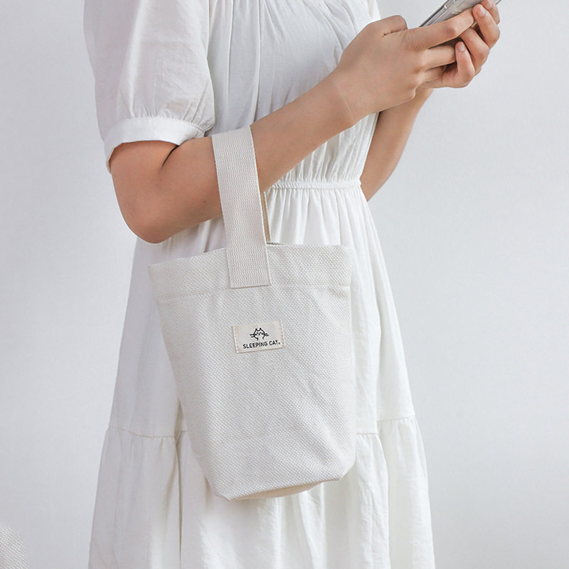 棉道日式散步遛弯装手机包迷你手腕包水桶女包小众手提帆布包,淘宝优惠券,粉丝福利购,淘宝优惠卷