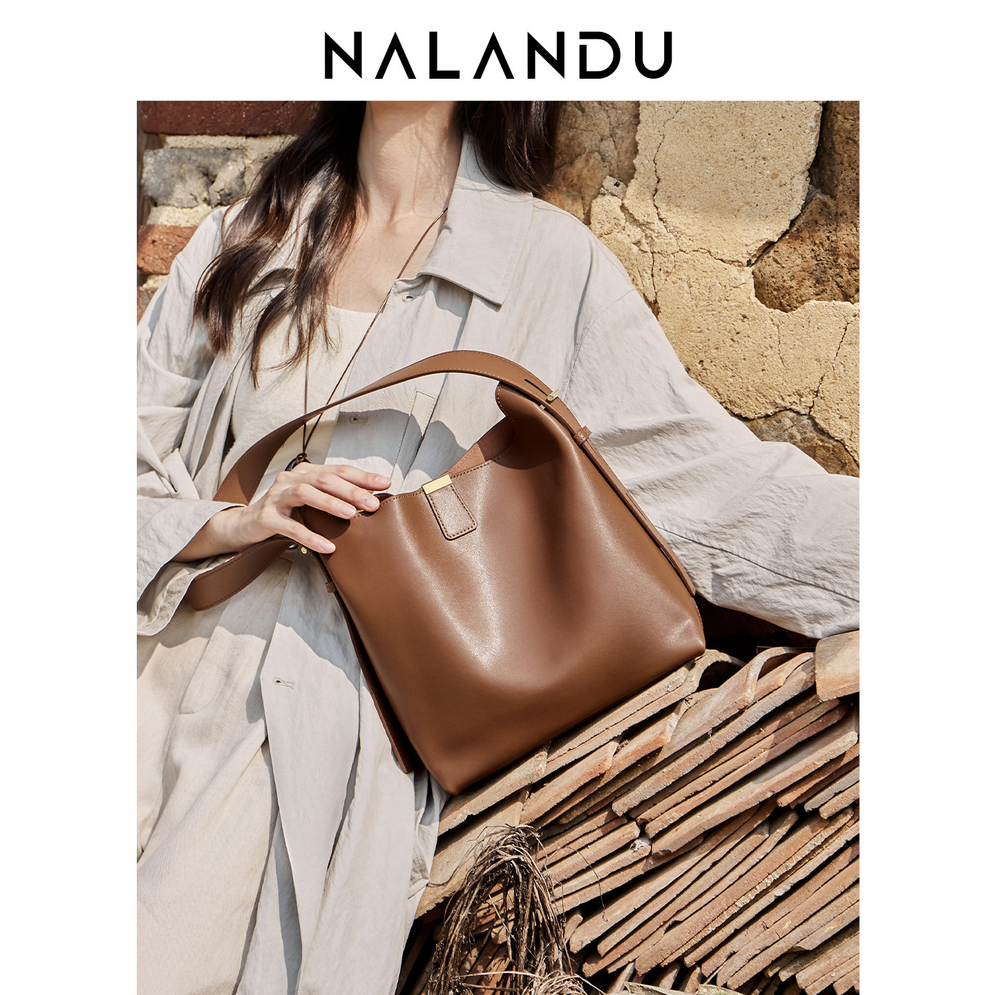 纳兰杜包包女式2025新款水桶包女款大容量通勤单肩斜挎包牛皮女包,淘宝优惠券,粉丝福利购,淘宝优惠卷