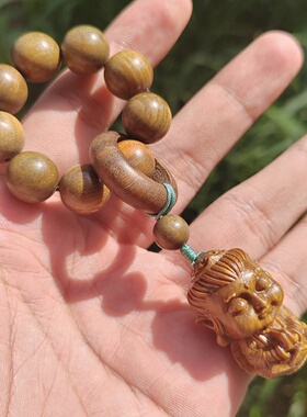 绿檀木千手观音手把件指尖文玩手