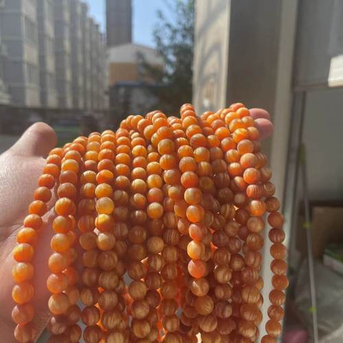 东北松明子木手串男长白山北沉香琥珀木全透光血龙木佛珠原木手链 - 图2