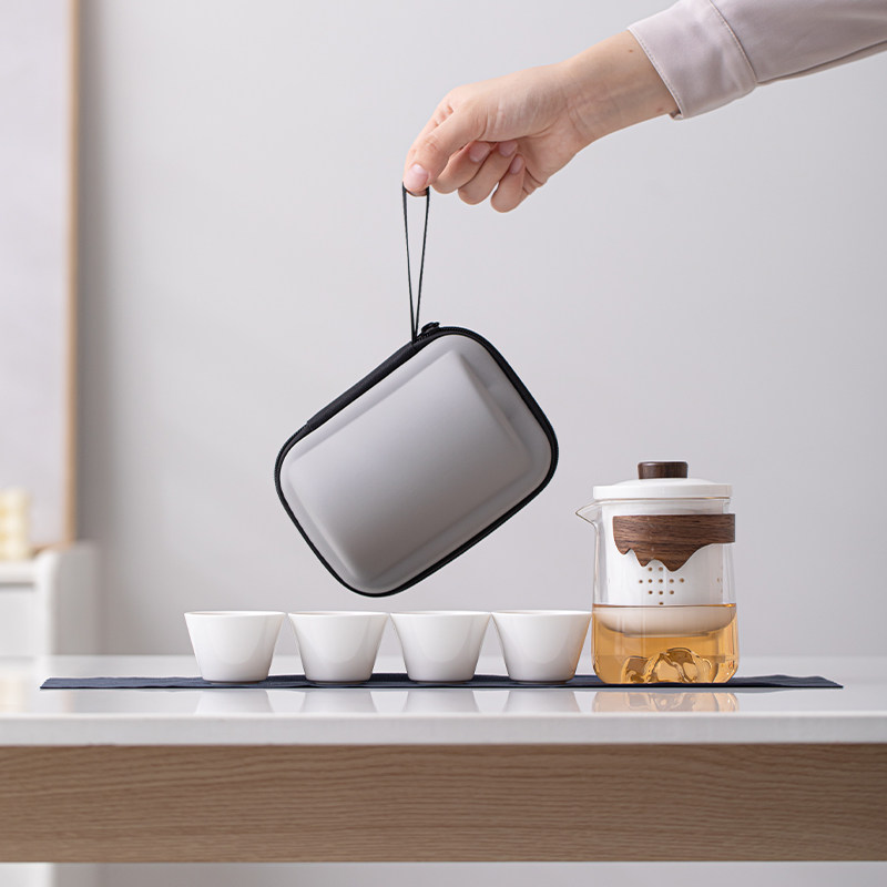 Dehua white porcelain one pot and four cups to find a trip