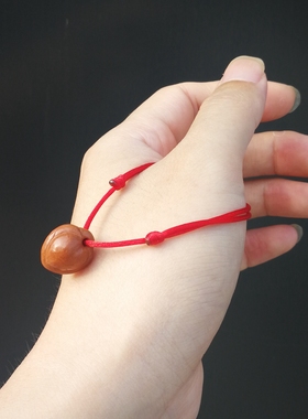 野生桃核雕刻心形桃篮红绳手绳