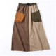 Japanese design niche splicing skirt Loose retro elastic waist temperament pocket commuter A-type skirt