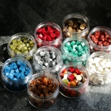 Огненная лак уплотнение уплотнение восковое зерно смешанное цветовое приглашения приглашения приглашения приглашения запечатывание восковой краски ретро краска краска Восковой зерно.