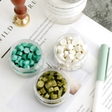 Огненная лак уплотнение уплотнение восковое зерно смешанное цветовое приглашения приглашения приглашения приглашения запечатывание восковой краски ретро краска краска Восковой зерно.