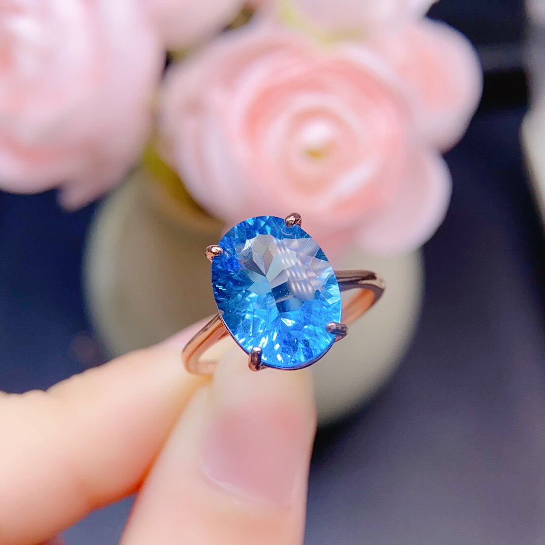 Swiss blue topaz ring, main stone size 10*13mm, 925 silver precision inlay. Hydrating water
