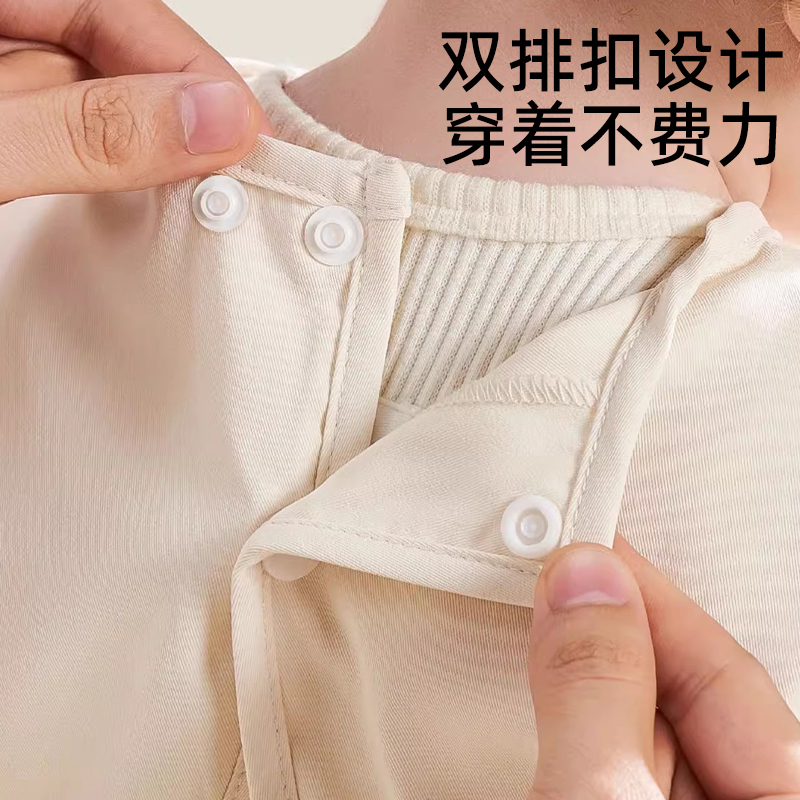 Baby eating coveralls and bibs