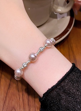 曼塔玫瑰色珍珠扭纹串珠手链轻奢