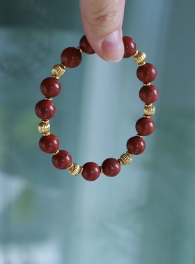 一抹亮色。天然红石圆球珠金色弹力手链时髦简约国风高级中式节日