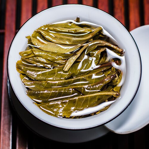 不是冰岛昔归老班章长生普洱茶生茶小龙珠球形沱粒装茶叶500g桶装 - 图2