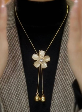 精致猫眼石花朵抽拉毛衣链