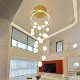 Large chandelier in villa living room, special lamp for stairwell