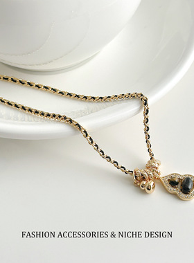 美拉德虎眼石葫芦项链女高级感气质毛衣链复古黑金编织轻奢锁骨链