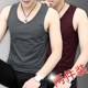 Wear a hot white fitness sweat-absorbing vest for men