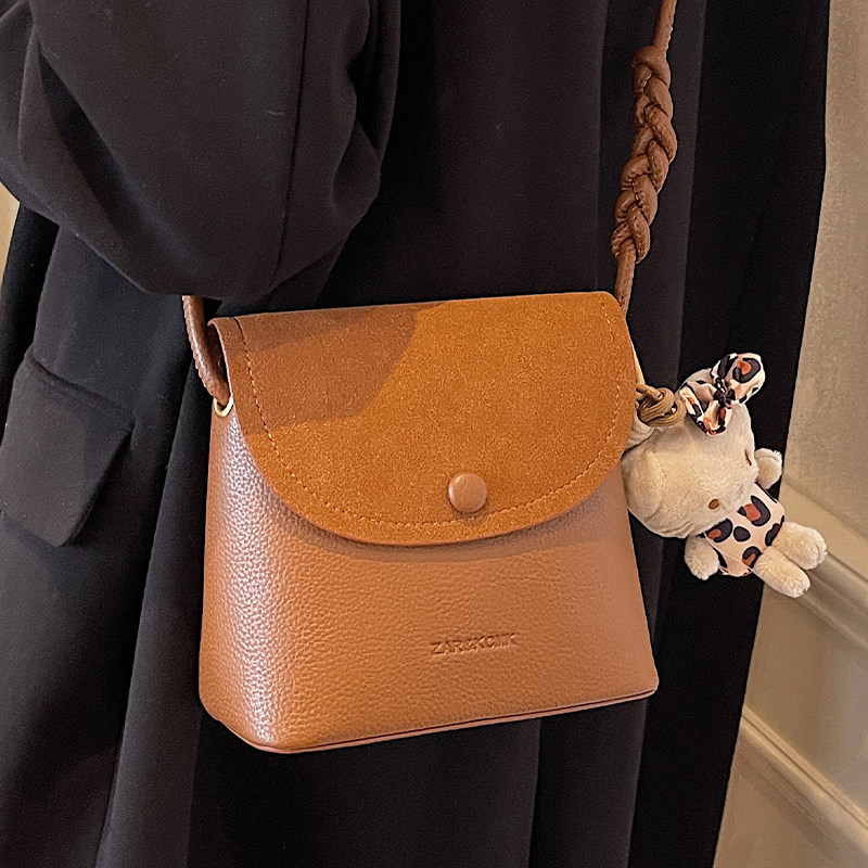 今年流行的包包女式2025年春夏高级质感休闲百搭单肩包斜挎水桶包,淘宝优惠券,粉丝福利购,淘宝优惠卷