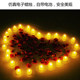 Electronic candles create romantic scenes and arrange flower petals