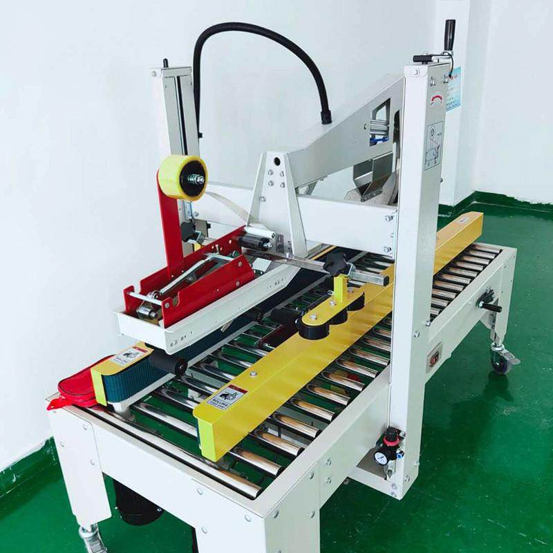 半自动折盖封箱机胶带自动封箱机左右驱动纸箱自动折盖封箱机机器,淘宝优惠券,粉丝福利购,淘宝优惠卷