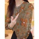ແມ່ຍິງຄົນອັບເດດ: ຄໍຕະຫຼອດ floral top