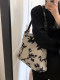 Niche jacquard canvas bag large capacity crossbody armpit bag